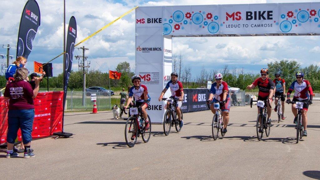 The Chamco Spokes bike team competes in a race.