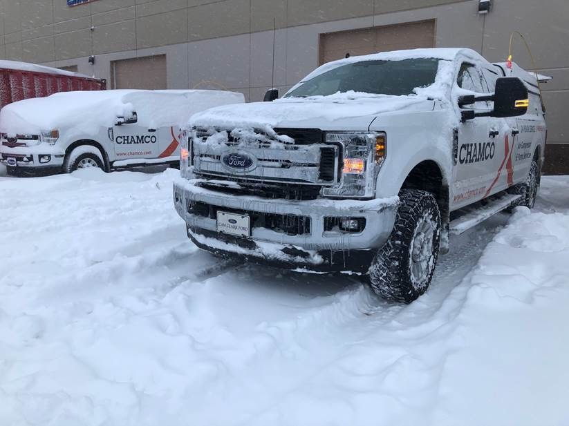 chamco truck covered in snow