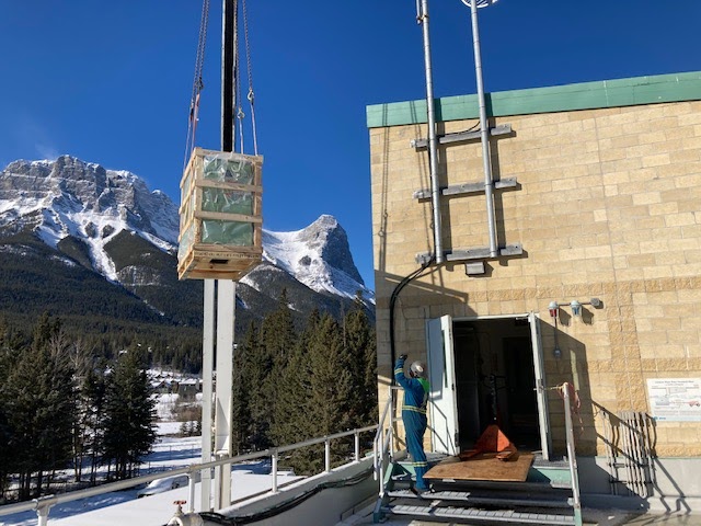 A sullair compressor lifted into a plant in the Canadian Rockies