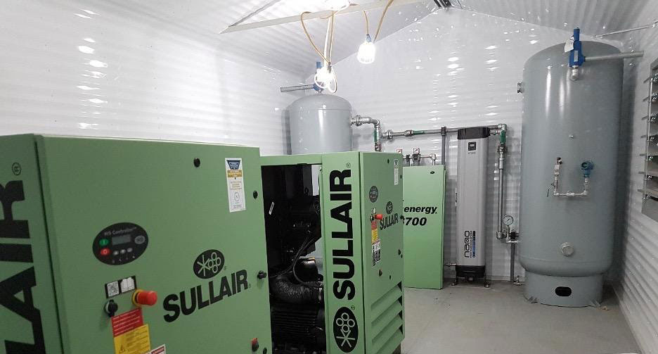 A group of Sullair air compressors