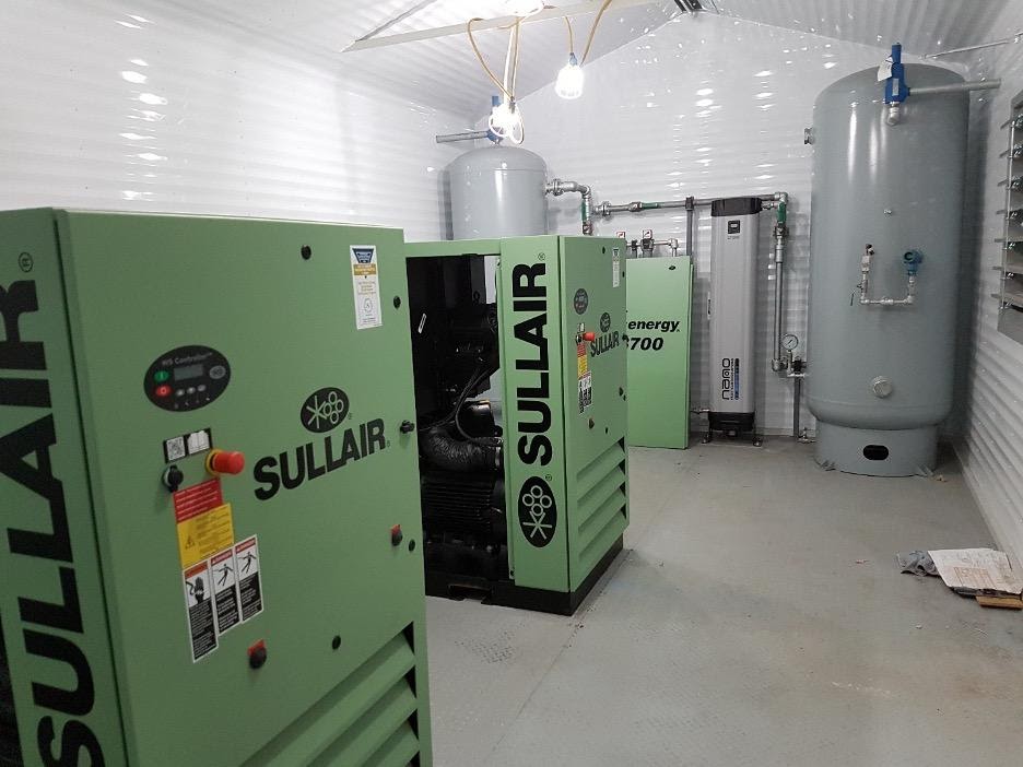 A group of Sullair air compressors