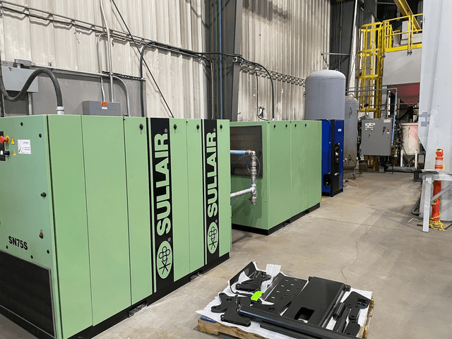 chamco-july7-air-compressor Two Sullair air compressors in a warehouse