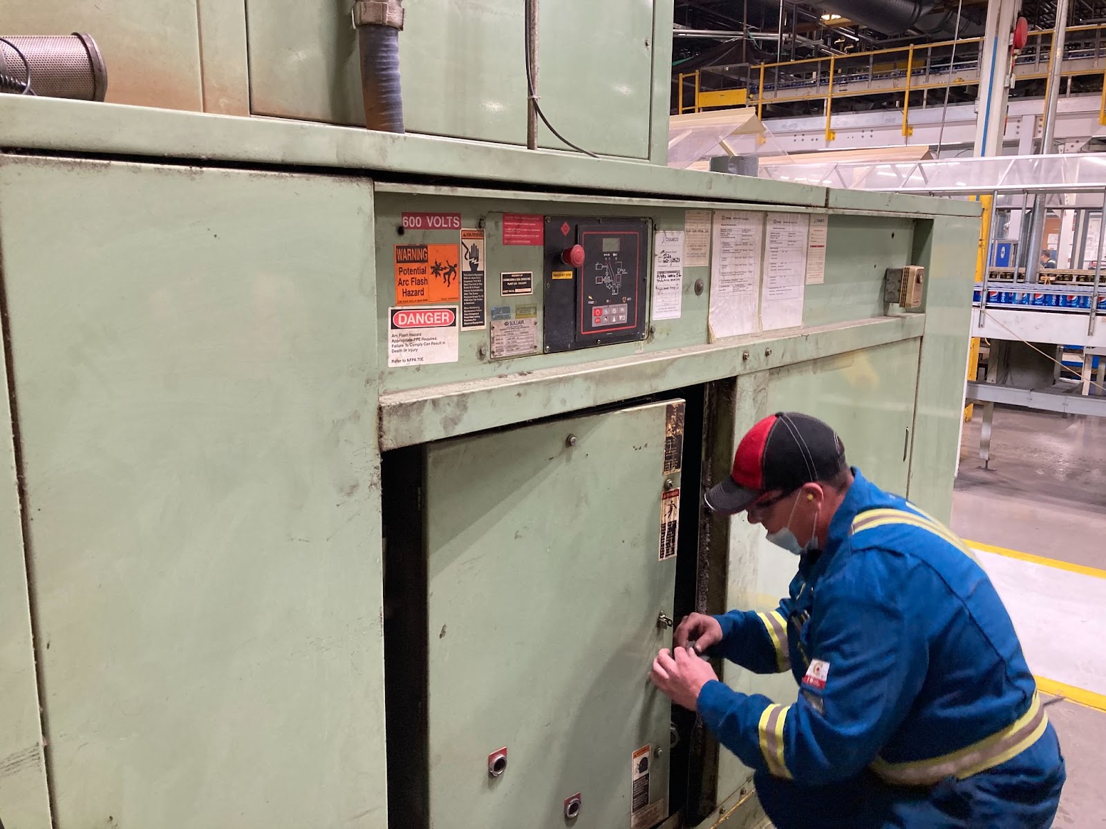 compressor-customer-care-program A service tech performing compressor maintenance