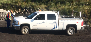 Chamco technician works on air compressors