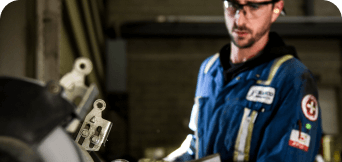 Chamco technician works on air compressors